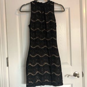 Tight black lace dress